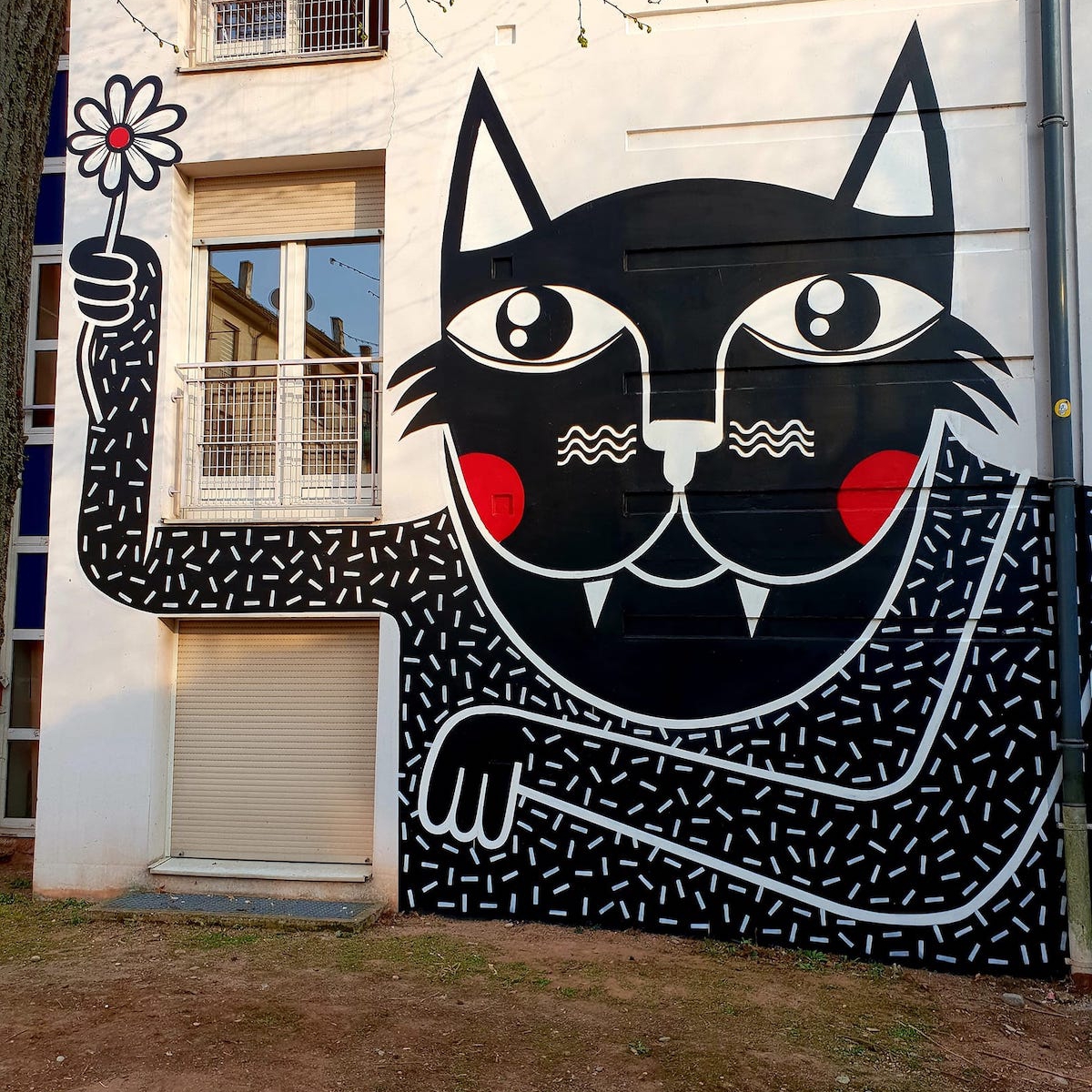 Artista de rua espalha personagens ilustrativos e divertidos em murais pintados